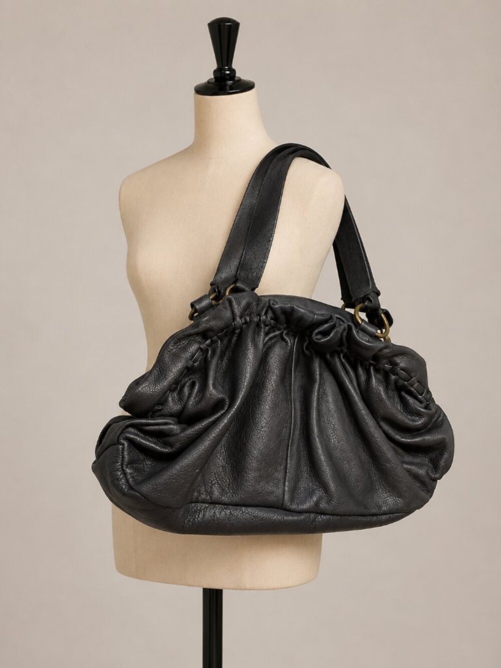 Violette Nozières Black Leather
Shoulder Bag with Striped Lining
